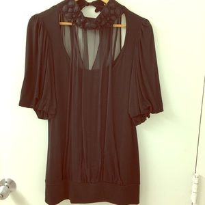 Black top with gem detailing on neckline