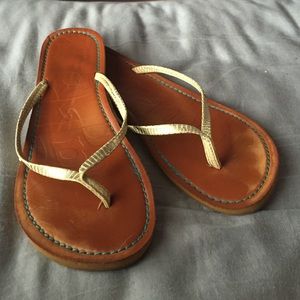 Gold flip flops