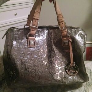 MK silver metallic satchel