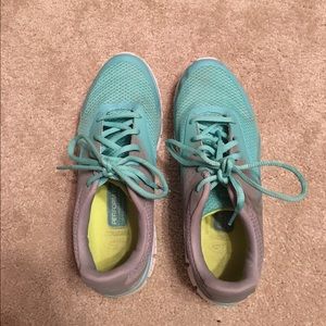 Light blue and gray Champion tennis shoes