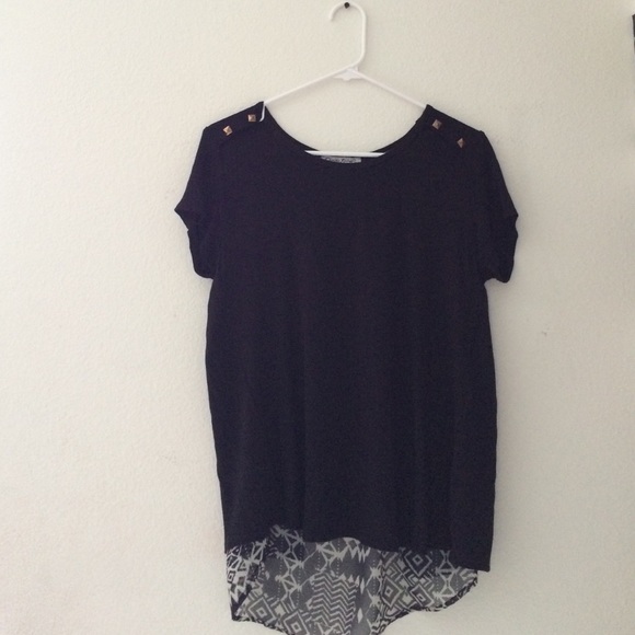 Black loose short sleeve top with a cool print.