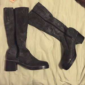 Black below the knee zip up heel boots