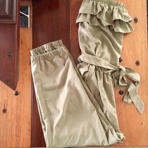 Olive strapless ruffle jumpsuit.