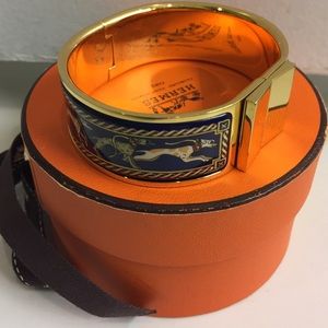 Hermes authentic enamel bracelet featuring dogs