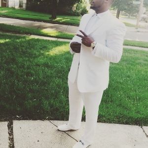 White XL suit w/ design on midsection of jacket