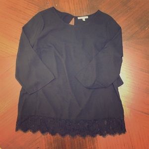 Open back, black lace lined blouse