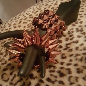 Set of copper spiked bangles