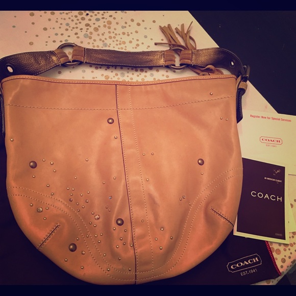 Rare Coach tan leather hobo with crystal accents