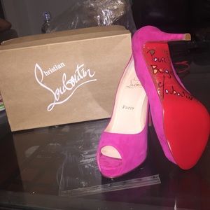 Suede fuschia Christian Louboutin signed by C.L.