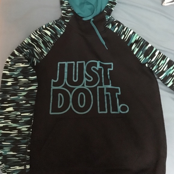 green/black colored Nike drifit sweatshirt
