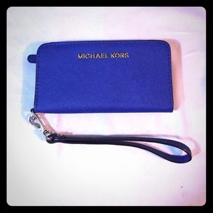 Authentic real Michael kors phone wristlet/ wallet