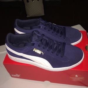 Navy blue suede Pumas