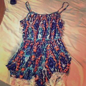Romper cheap never worn lace trim and cut up side
