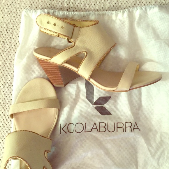 Koolaburra sandals with a small heel.