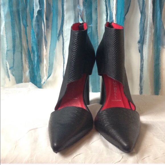 Black 4 inch heels. By Jeffery Campbell Barnes.