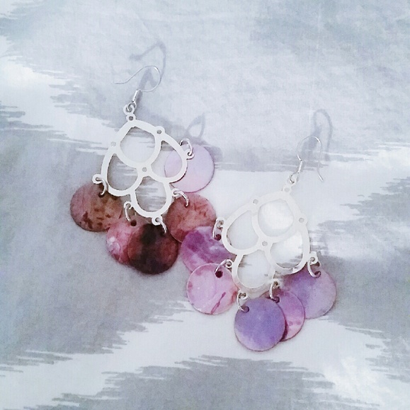 Purple shell dangle earrings.
