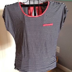 Stripped navy and white shirt with coral accents