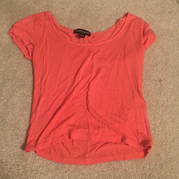 Coral colored crop top.