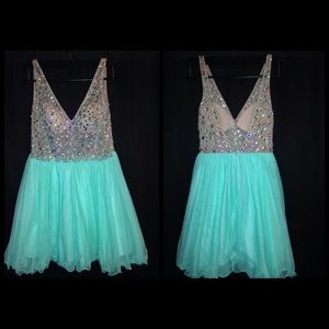 Short blue and nude sequined party dress.
