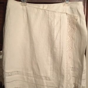 Cream colored linen wrap handkerchief skirt.