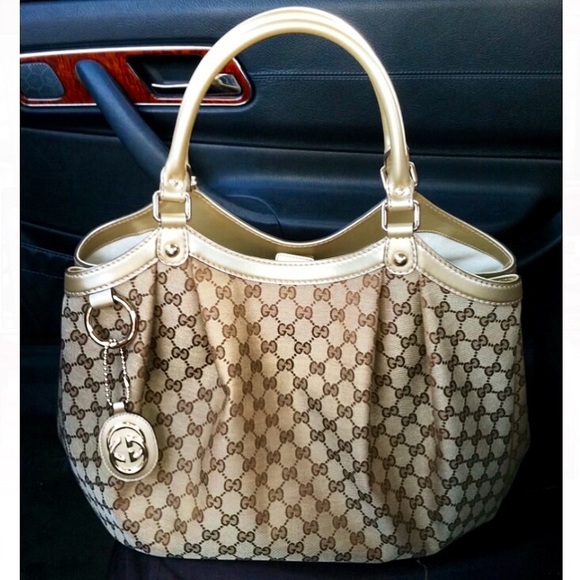 Gucci Sukey GG tote w/ Metallic Gold trim worn 2X