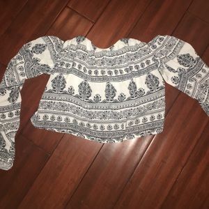 Sweat heart neckline shoulder- less top.