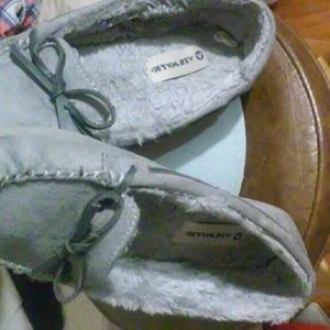 Gray moccasins. Medium use. In great condition.