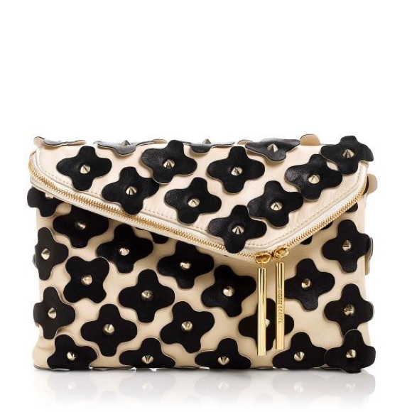 ISO HENRI BENDEL ASYMMETRIC DEBUTANTE FLORALCLUTCH