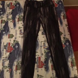 Black, grey, and white Nike yoga running pants