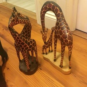 Two wooden giraffes
