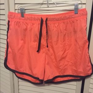 Orange running shorts