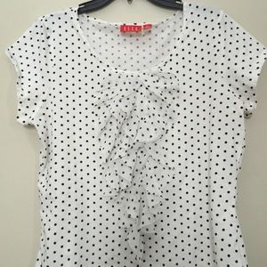 Adorable white top w/ black dots.