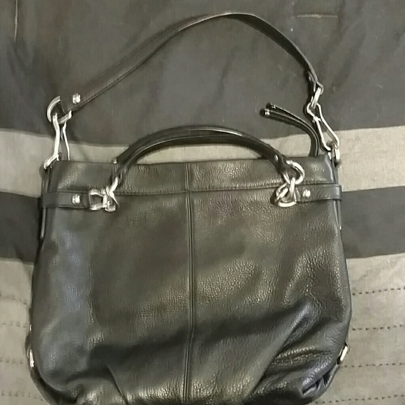 Coach purse, had been well loved.