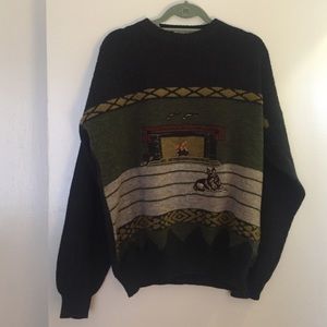 Amazing sweater with dog lounging in front of fire