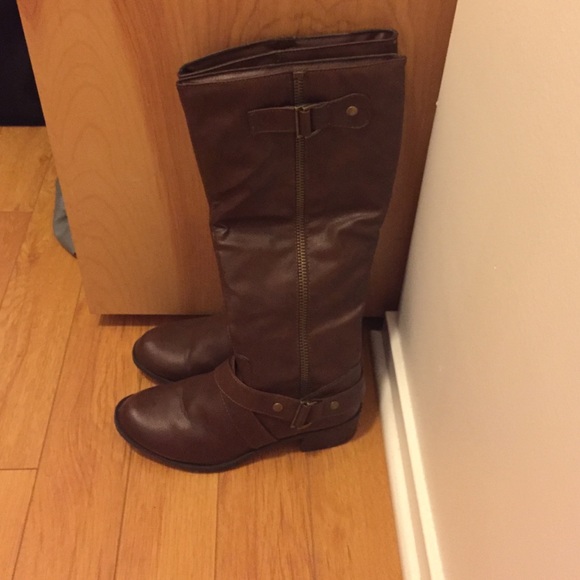 Tall brown riding boots