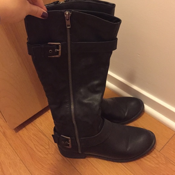 Tall black riding boots