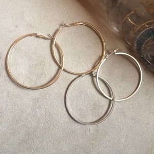 Gold and silver hoop earrings.