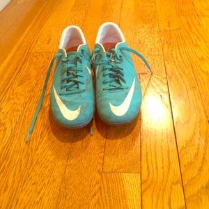 Bright blue, mercurial cleats.