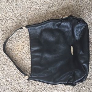 Michael Kord black purse.