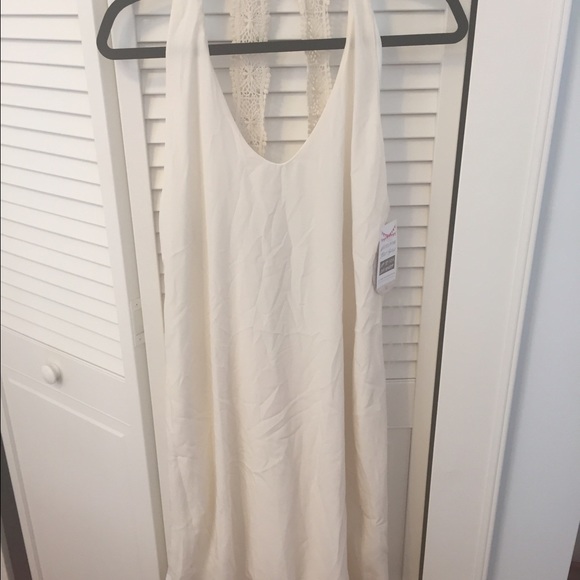 Brand new cream backless detail dress
