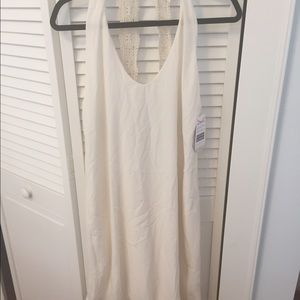 Brand new cream backless detail dress