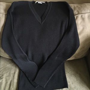 Men's wool v-neck ribbed sweater in black.