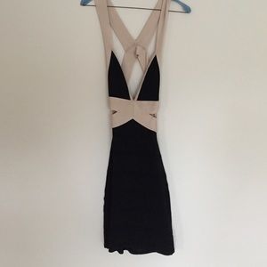 Black and nude Herve lager looking dress