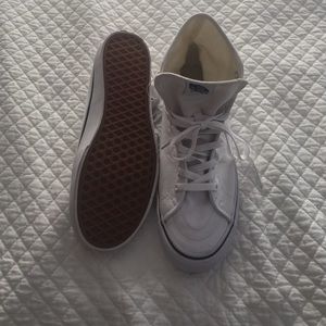 High-top white vans