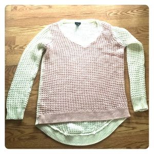 Pink and ivory sweater.