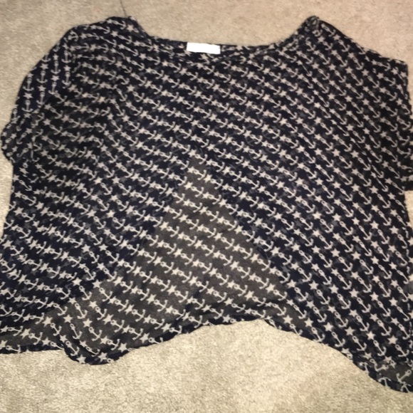 sheer anchor shirt with a slit in the back