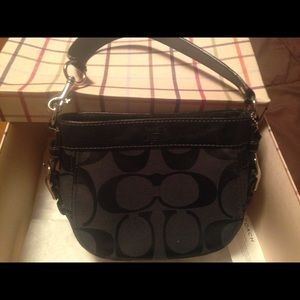 Blk Coach top handle printed signature fabric.