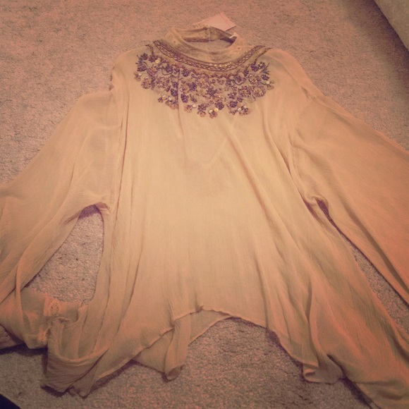 Beautiful jeweled open back blouse