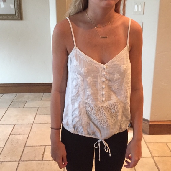 Cream tank top with adjustable spaghetti straps