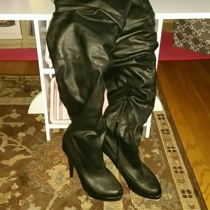Over the knee high heeled boot